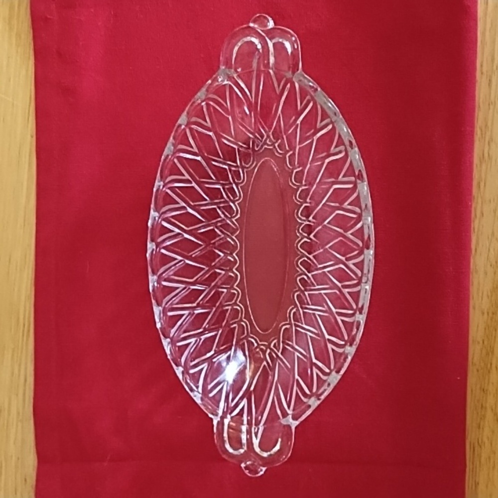 PRETZEL PATTERN CLEAR INDIANA GLASS. USED AS A CELERY OR PICKLE DISH.